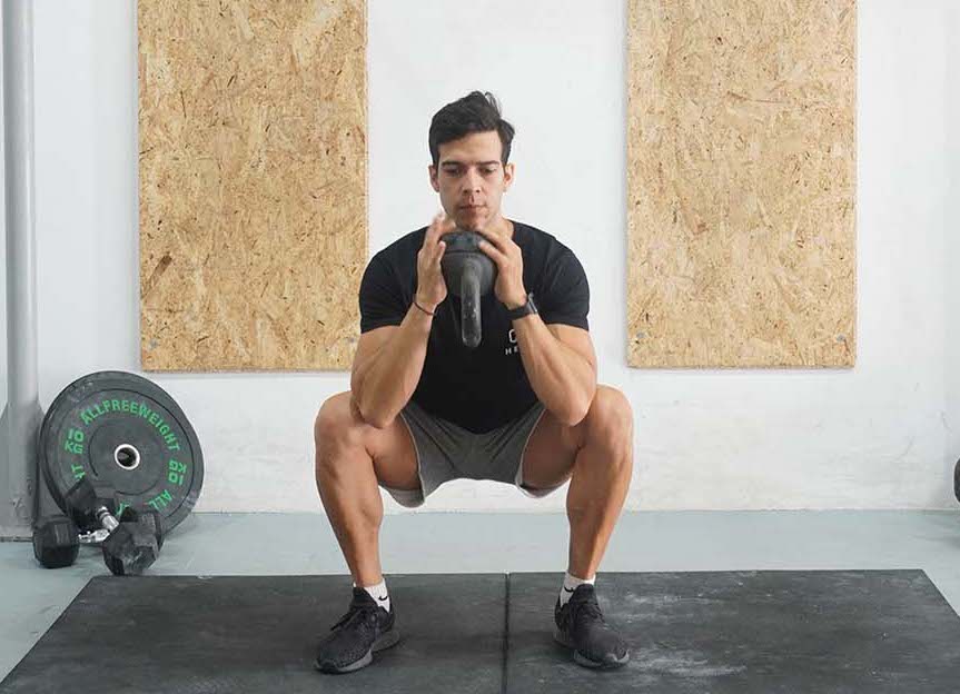 man kettlebell goblet squat