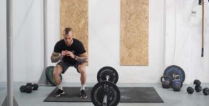 man burpee over the bar barbell squat