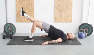 man single leg glute bridge